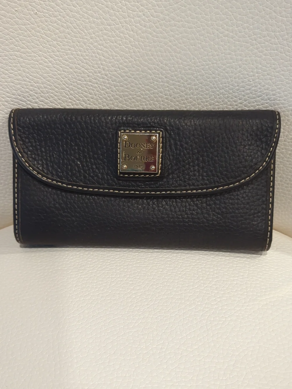 Dooney & Bourke Black Pebbled Leather Flap Wallet with Gold Plaque